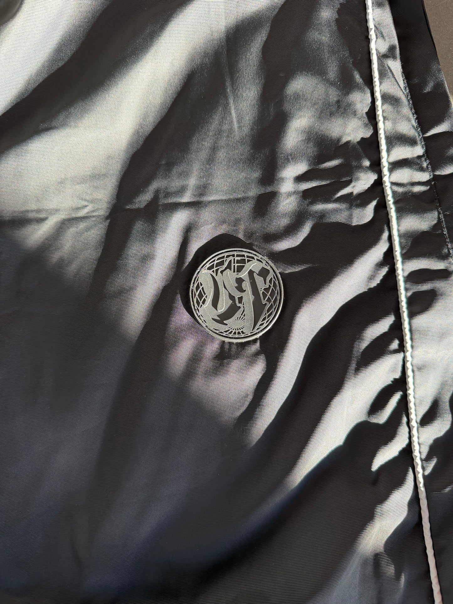 Unknown Truths Black Track Pants (PRESALE)