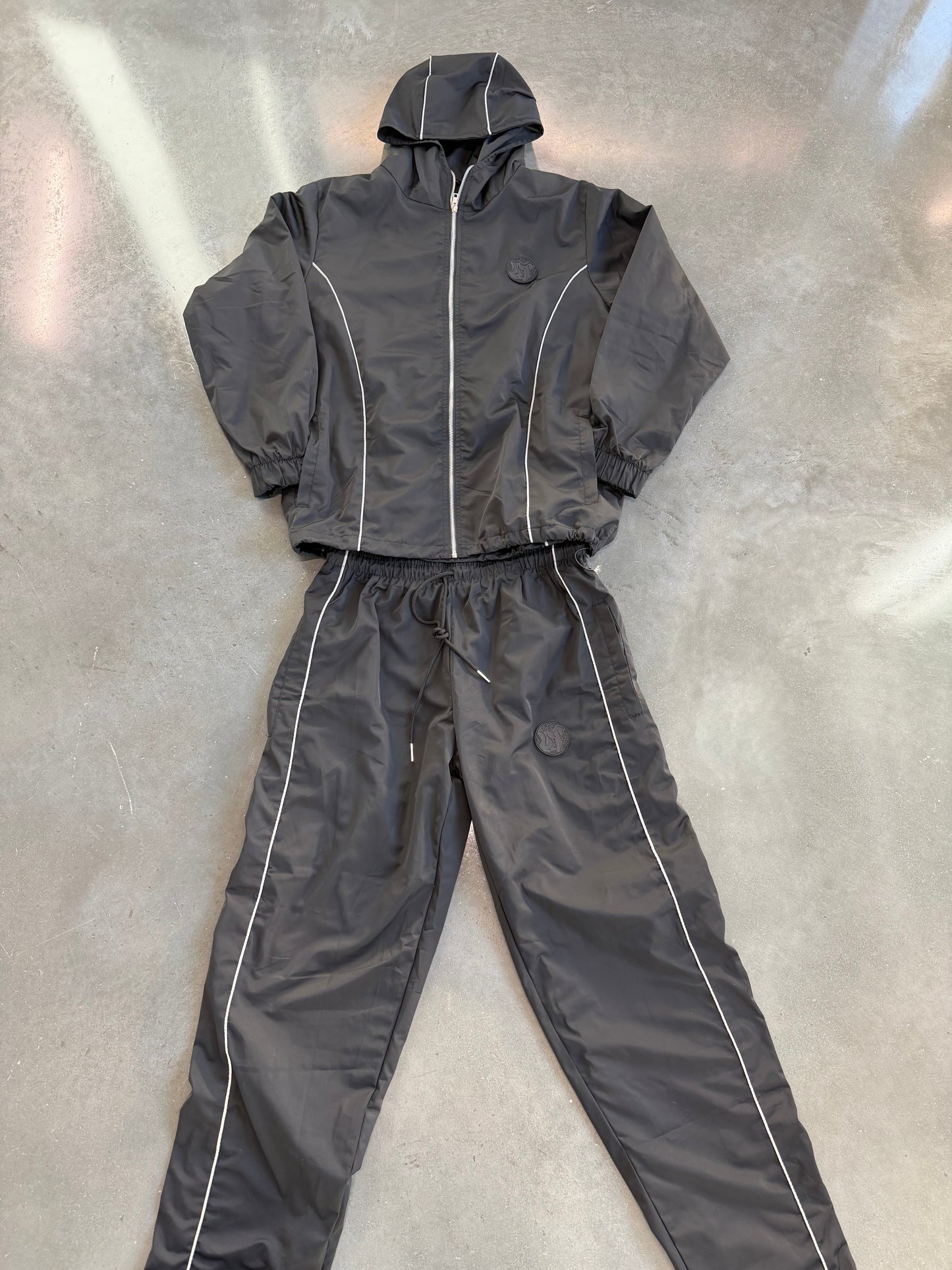 Unknown Truths Tracksuit (Black) (PRESALE)